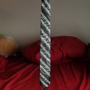 Black with white music notes tie